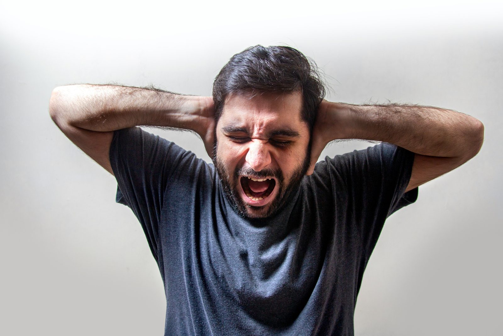 A man looking drained and worn down after a long stretch